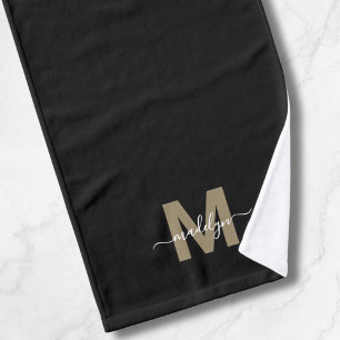 Monogramme élégant en écriture dorée noire