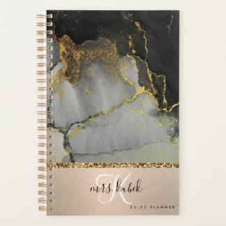 Monogramme en or et en marbre noir Planificateur e