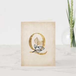 Monogramme en or et noir Q avec Feuille