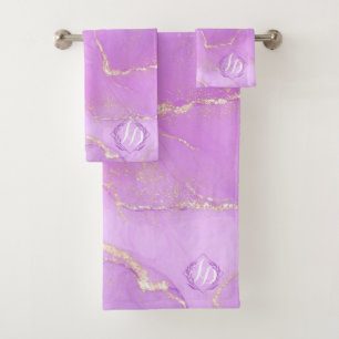 Monogramme en or rose marbré