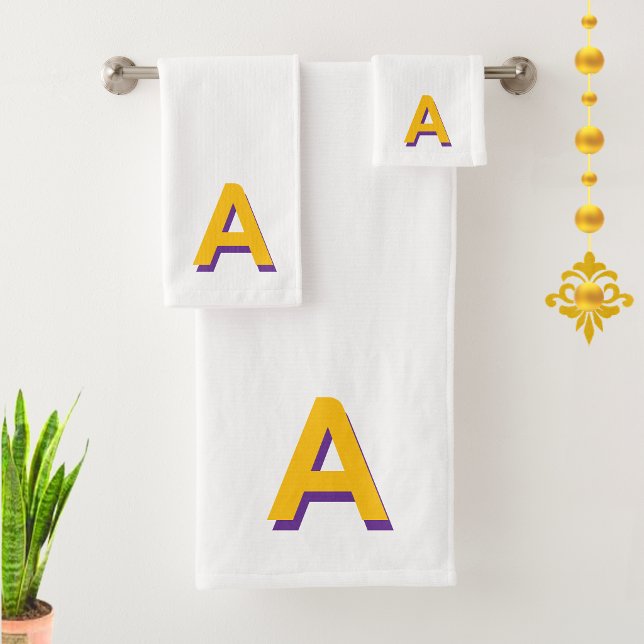 Monogramme jaune doré sur fond blanc (Créateur téléchargé)