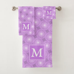 Monogramme lilas cercles pourpres motif