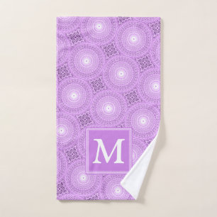 Monogramme lilas cercles pourpres motif