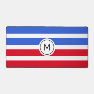 Monogramme sur fond rayé bleu saphir, rouge et bla