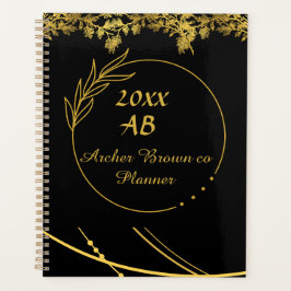 Monogrammgeschäft mit dem schwarzen und goldenen L Planer