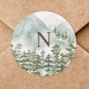 Monogrammiertes Wasserfarbenbild von Wald und Berg Runder Aufkleber