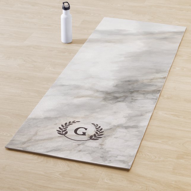 Monogrammm. Weizenlaurel auf weißem Marmor. Yogamatte (Beispiel)