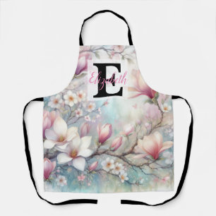 Monogrammname auf Wasserfarbenblumen in Pastellfar Schürze