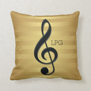 Monogrammschwarzer dreifacher Clef auf goldenen Kissen