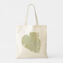 Monstera-Blätter in sanft grüner Tote-Tasche