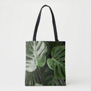 Monstera Blätter, luxuriöse tropische Anordnung. Tasche