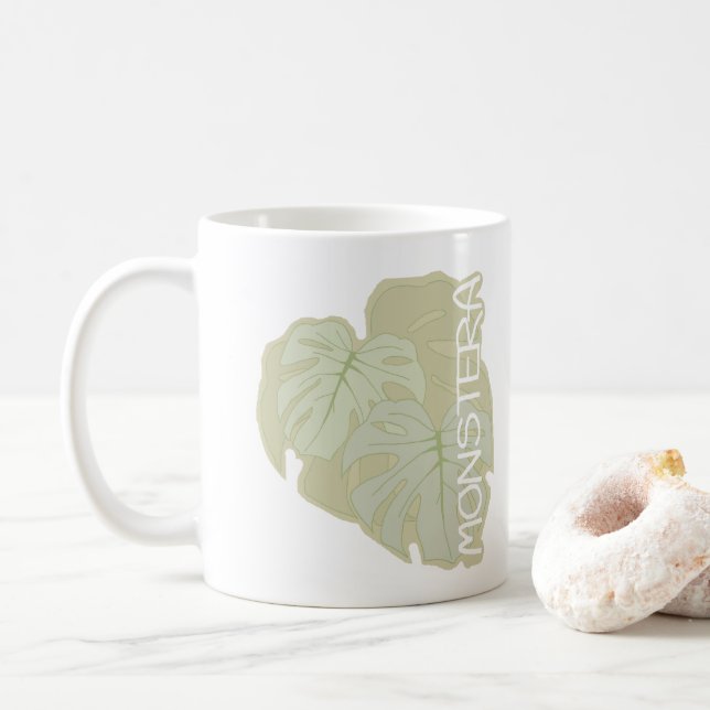 Monstera foliage in weichem Grün Kaffeetasse (Mit Donut)