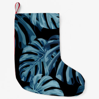 Monstera Pflanze: blaues Blätter Muster. Kleiner Weihnachtsstrumpf