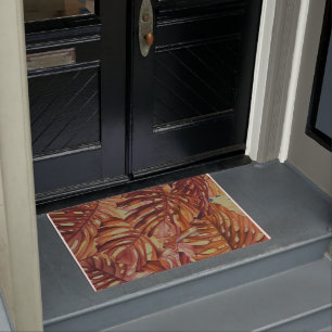 Monstera tropical laisse le tapis de porte de