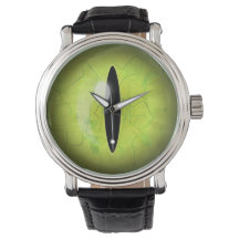 Montre à poignet de l'oeil de serpent jaune vert c