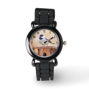 Montre Bickadee sur la peinture d'alimentation - Oiseaux