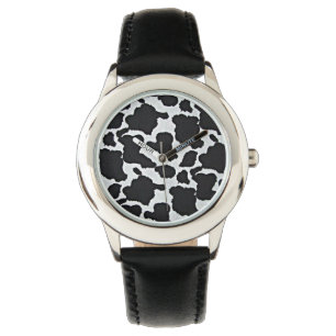 Montre blanche noire d'impression de vache