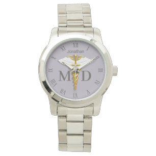 Montre Caducée doré aux ailes blanches Nom Médecin généra