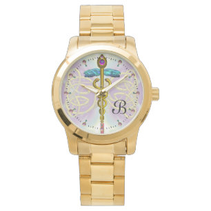 MONTRE CADUCUS D'OR AVEC DES NOEUDS CELTIQUES MONOGRAMME 