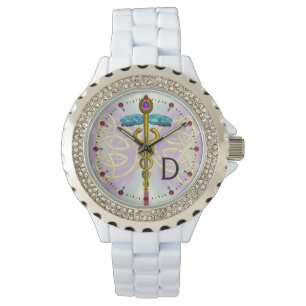 MONTRE CADUCUS D'OR AVEC DES NOEUDS CELTIQUES MONOGRAMME 