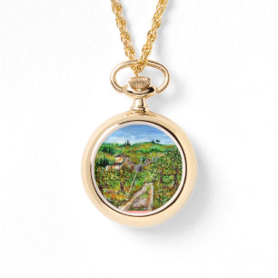 MONTRE COLLINES VERTES ET OLIVIERS DANS LE PAYSAGE TOSCAN