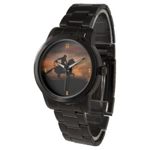 Montre Cowboy à cheval Racing au coucher du soleil