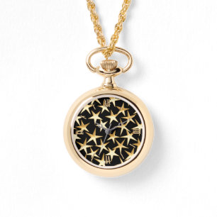 Montre étoiles d'or sur un arrière - plan noir