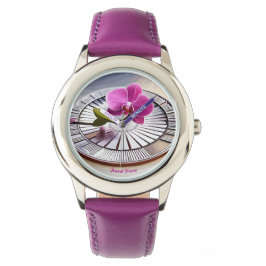 Montre Exquise orchidée rose repose sur une plaque d'arge