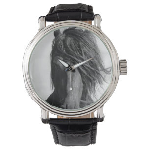 Montre Friesian Stallion au vent.