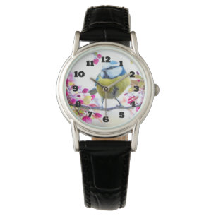 Montre Joli oiseau bleu et jaune sur une branche Photogra