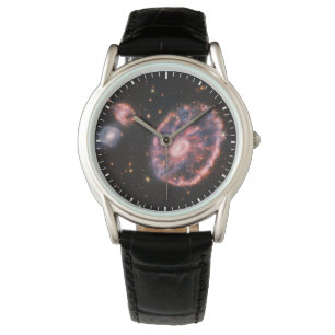 Montre La Galaxie Cartwheel Et Ses Galaxies Compagnons.