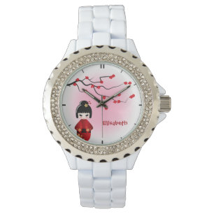 Montre La poupée japonaise de kokeshi à Sakura fleurit