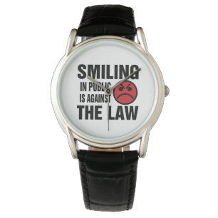 Montre Le sourire l'en public est contre la loi