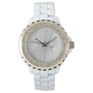 Montre Libellule sur des marguerites