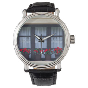 Montre Logements résidentiels avec des fleurs dans les fe