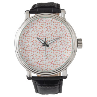 Montre Motif floral rouge délicat sur fond crème doux 