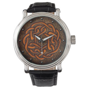 Montre Orange lumineuse de noeud celtique sur l'art