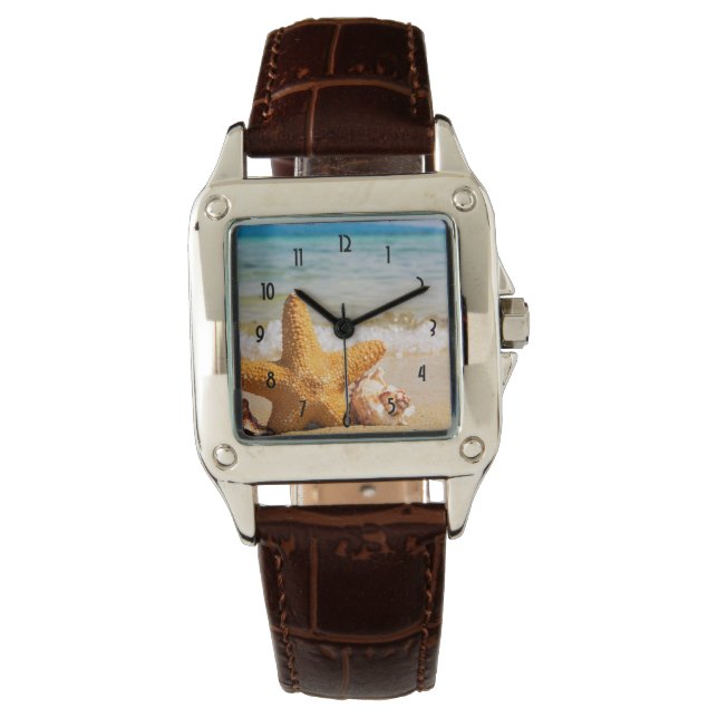 Montre Poisson étoilé et coquillages sur la plage (devant)