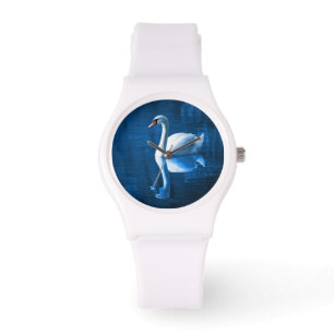 Montre Pretty white swan floating on blue lake