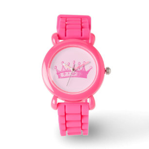 Montre Princesse magenta Crown sur l'arrière - plan rose