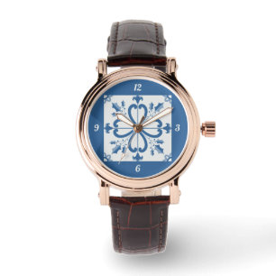 Montre Sacré de Noël et pétales de fleurs carreaux bleus