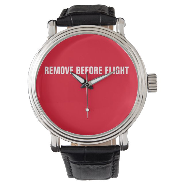 Montre SUPPRIMER AVANT LE VOL - Veille électronique (devant)