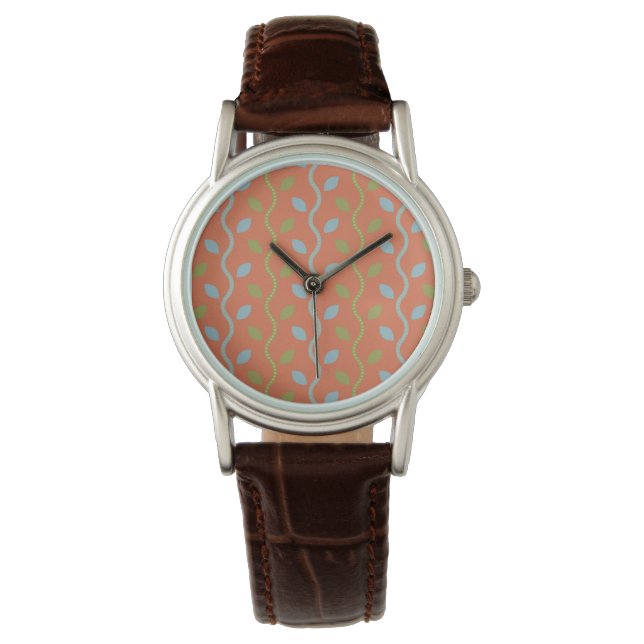 Montre Vins bleus et verts rétro sur motif floral orange (devant)