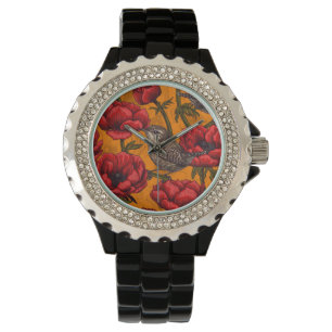 Montre Wens dans un jardin d'anémones rouges