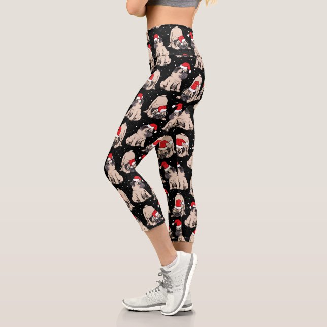 Mops in Weihnachtsmannmützen Weihnachtsmuster Capri Leggings (Links)