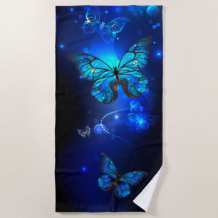 Morpho Butterfly im dunklen Hintergrund Strandtuch
