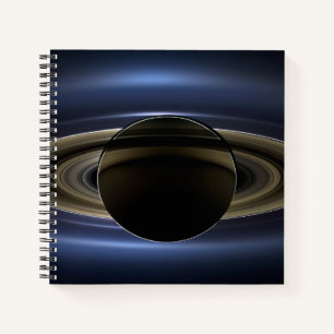 Mosaik des Saturn-Systems, das von der Sonne zurüc Notizbuch