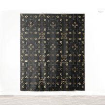 Motif de l'oeil en or antique sur tapisserie noire