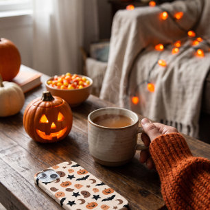 Motif d'Halloween avec des fantômes et des citroui