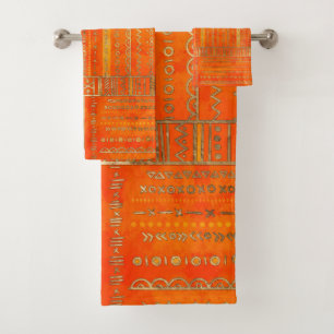 Motif ethnique tribal or sur orange vif